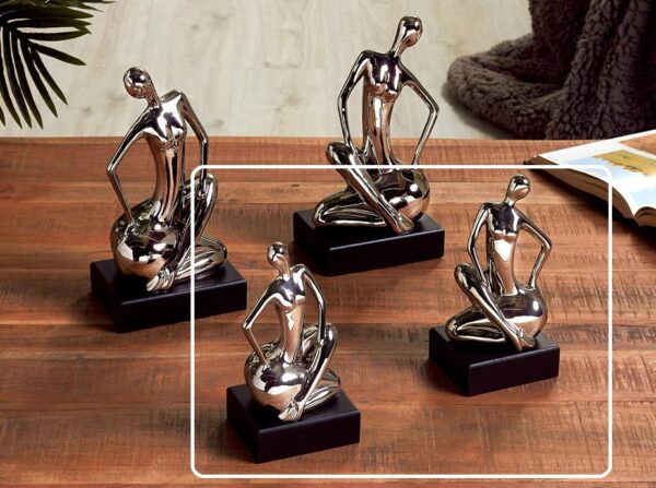FIGURA S/2 MUJER SENTADA C/BASE 22