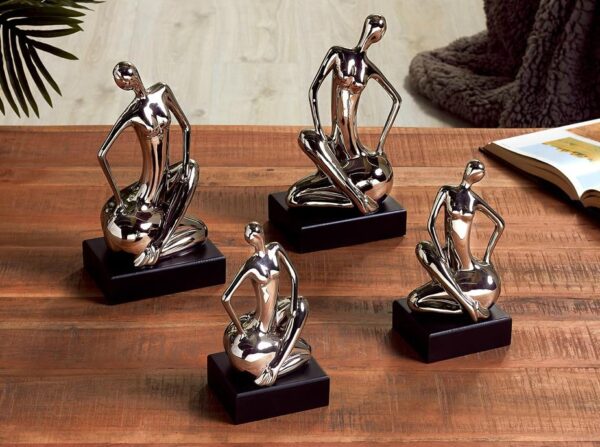 FIGURA S/2 MUJER SENTADA C/BASE 22
