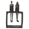 FIGURA RES PAREJA SENTADA DOR 17X10X27CM