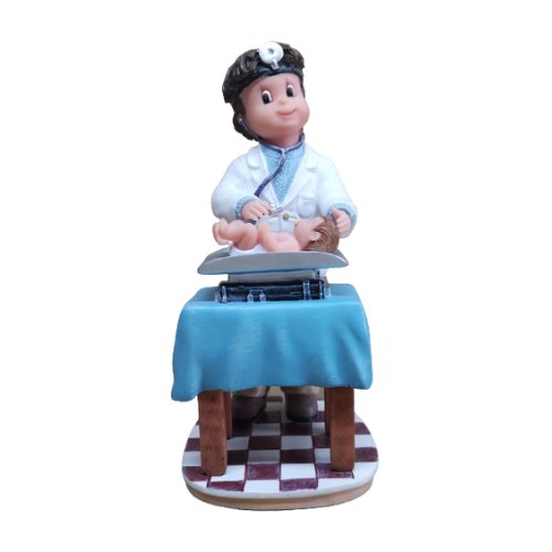 El pediatra (Peq.), figura de colección Nadal ref. 746775: un pediatra que pesa a un bebé en la báscula de la consulta