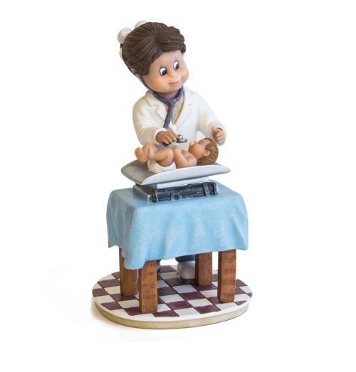 Pediatra (pequeña), figura de colección Nadal ref. 746776: una pediatra que pesa a un bebé en la báscula de la consulta